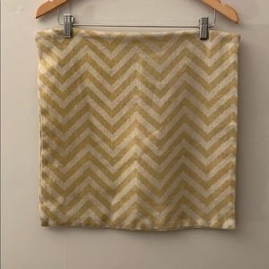 Two yellow chevron pillow covers